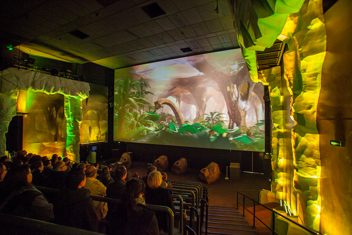 theater interior with ice age on screen